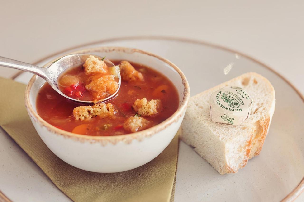 Longlands Inn & Cottages Carnforth Exteriér fotografie A bowl of soup with a bread roll